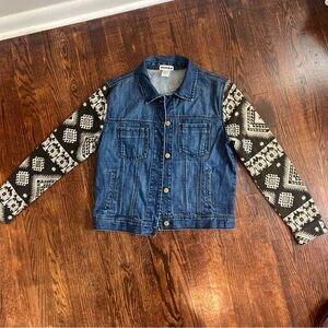 Denim jacket with tribal sleeves